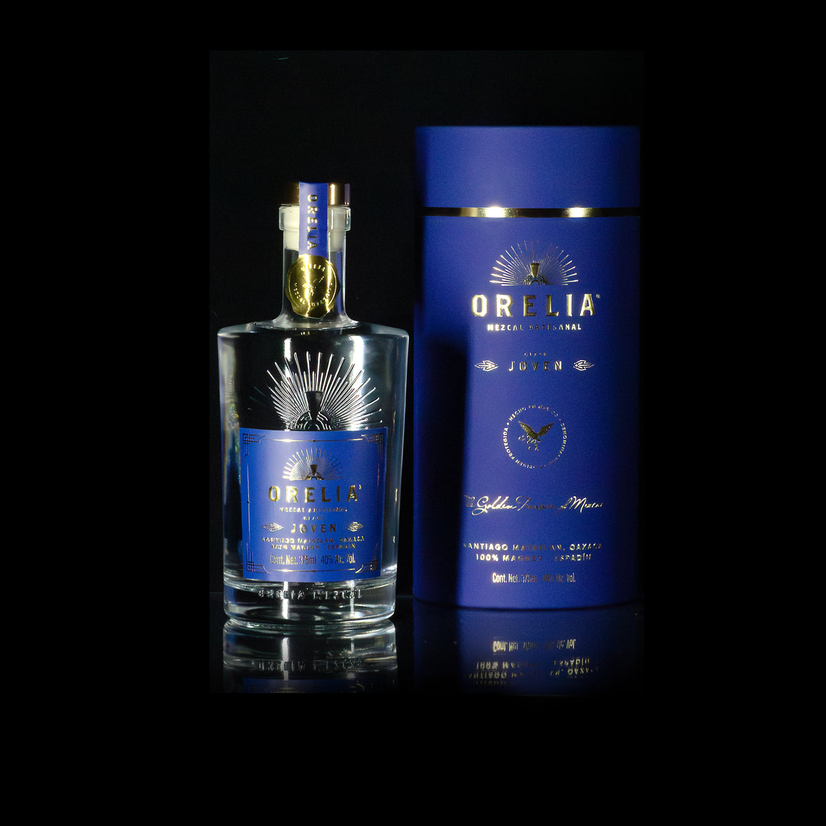 Orelia Mezcal Artesanal Joven 375 ml bottle with matching cylindrical box