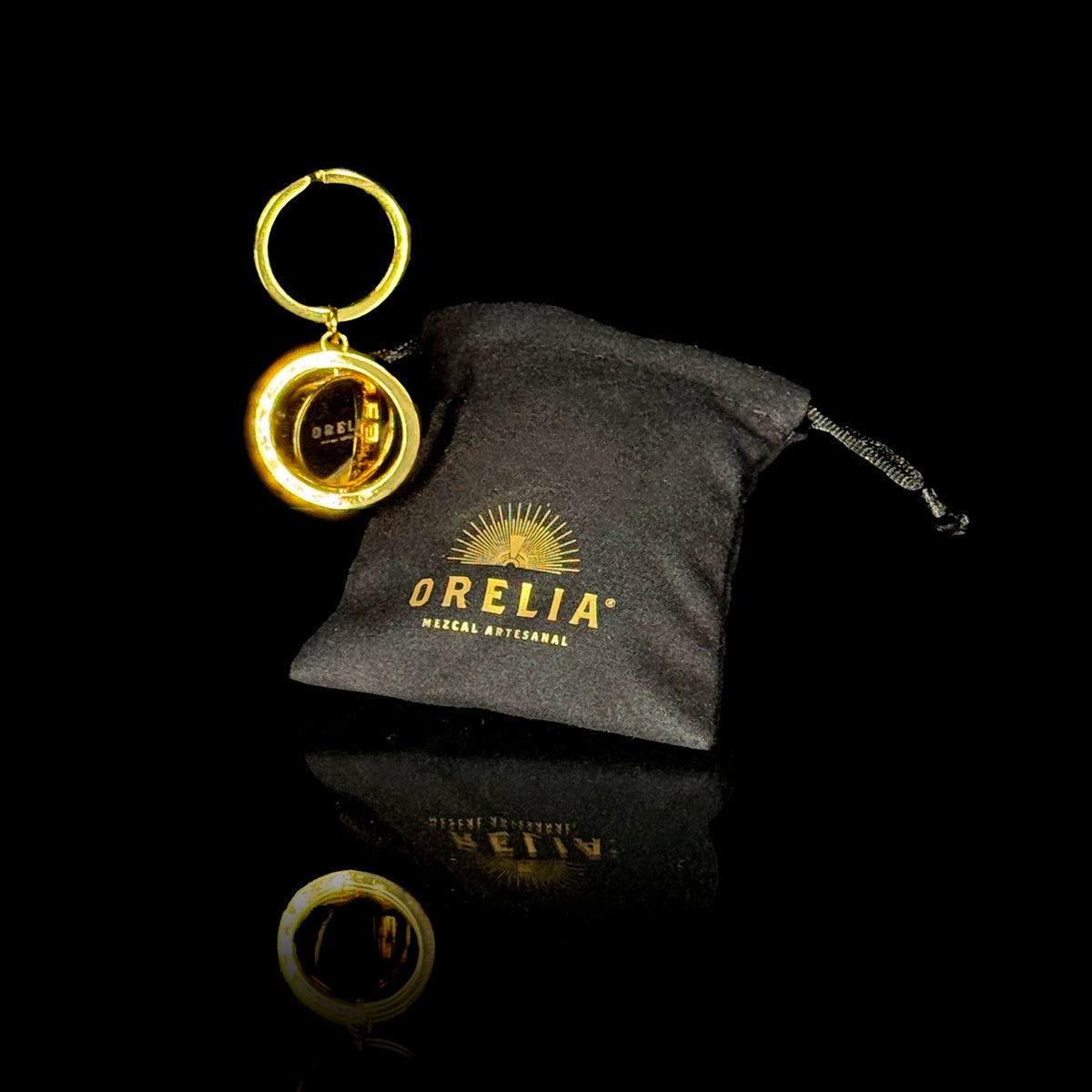Orelia Mezcal Artesanal gold keychain with pouch