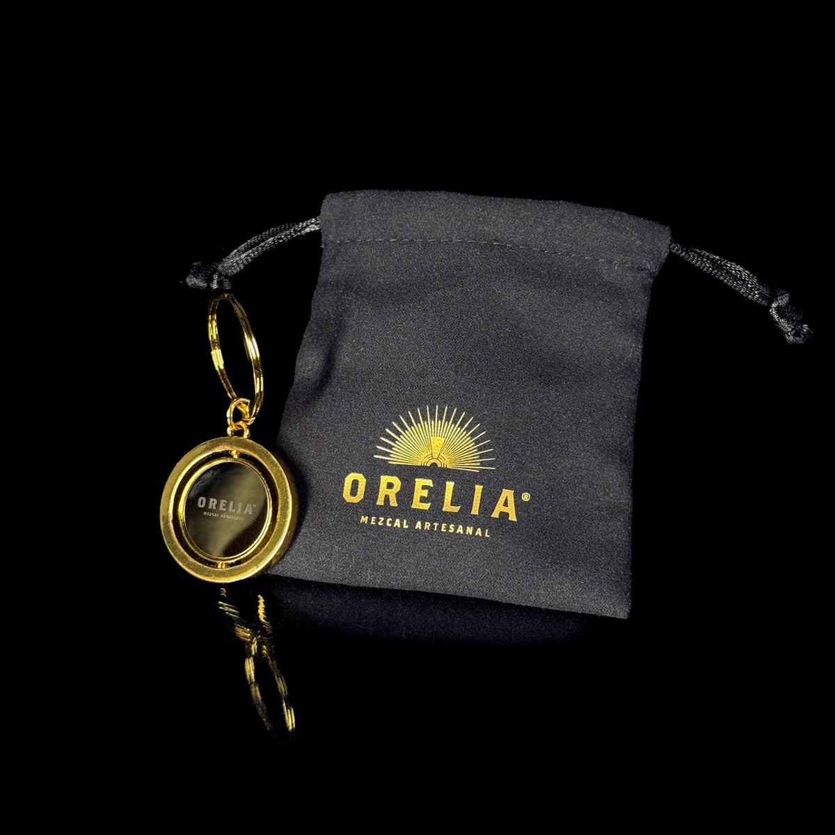 Orelia Mezcal Artesanal gold keychain with pouch